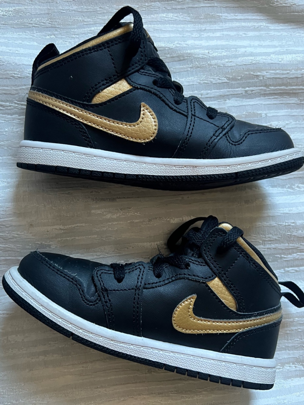 Jordan Kids Black and Gold High-Top Sneakers